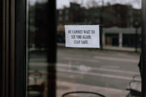 Sign hanging in a window